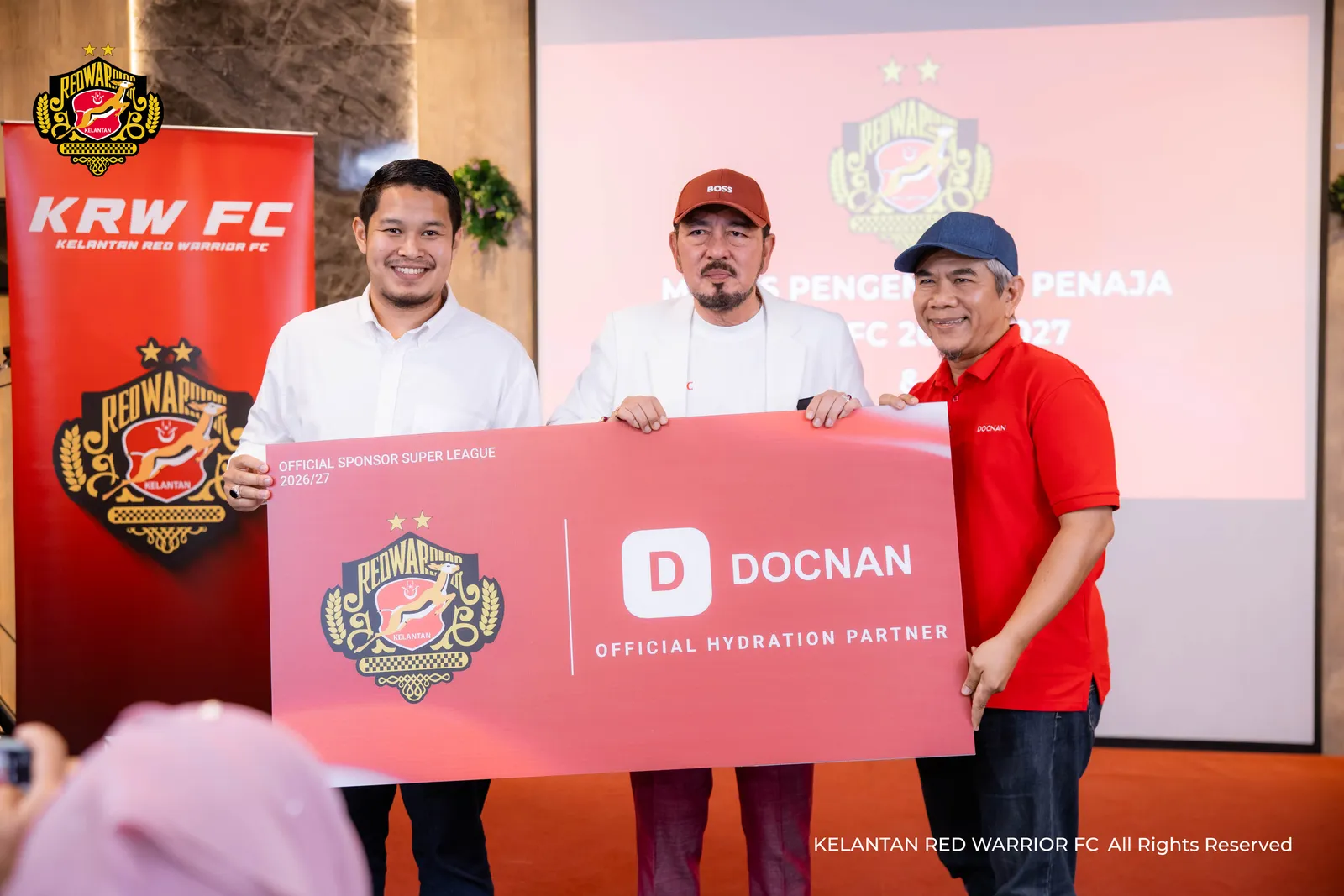 Majlis pengumuman penajaan Kelantan Red Warrior FC musim 2026/27 bersama Air Mineral DOCNAN sebagai Rakan Kongsi Hidrasi Rasmi